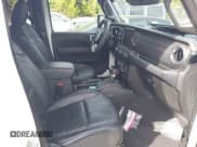 ✅ 2023 Jeep Wrangler Sahara • VIN: 1C4JJXP68PW696246 • Lot: 43210023. Listed on IAAI with 41,232 mi. Free auction sales archive from the USA and detailed vehicle history report at DreamBid. Image 5.