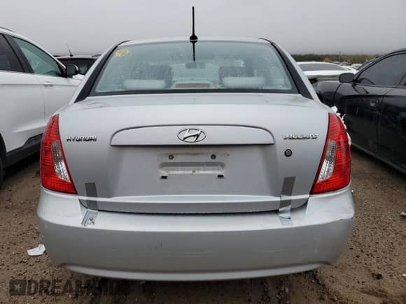 2011 Hyundai Accent GLS с VIN KMHCN4AC2BU536969, выставлен на аукционе Copart как лот 76917784 с пробегом 77 868 миль миль и Списание • Salvage title. История ставок и продаж доступна на DreamBid. Изображение 6.
