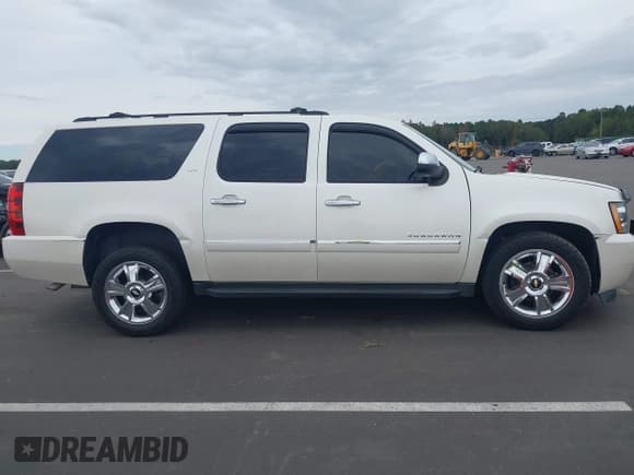 ✅ 2010 Chevrolet Suburban LTZ • VIN: 1GNUKKE35AR165749 • Lot: 43431739. Listed on IAAI with 221,583 mi. Free auction sales archive from the USA and detailed vehicle history report at DreamBid. Image 12.