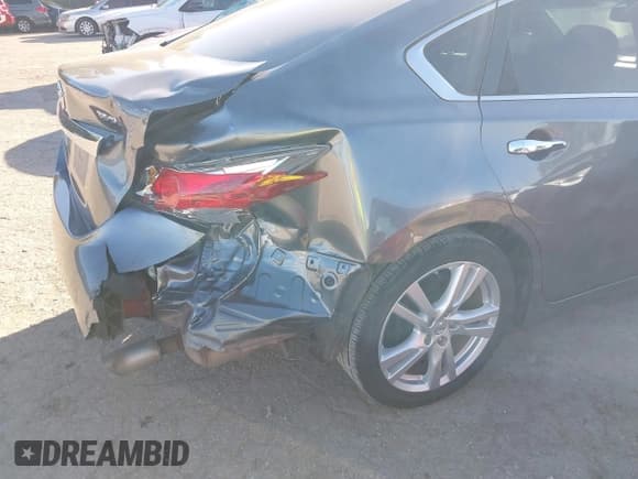 ✅ 2014 Nissan Altima SL • VIN: 1N4BL3AP6EC113265 • Лот: 43615683. Опубликован ранее на IAAI с пробегом 95 847 миль. Бесплатный доступ к архиву аукционных продаж из США и подробный отчёт об истории автомобиля на DreamBid. Изображение 13.