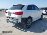 ✅ 2018 Audi Q3 Premium Plus • VIN: WA1JCCFS5JR026980 • Лот: 43168665. Опубликован ранее на IAAI с пробегом 86 255 миль. Бесплатный доступ к архиву аукционных продаж из США и подробный отчёт об истории автомобиля на DreamBid. Изображение 4.