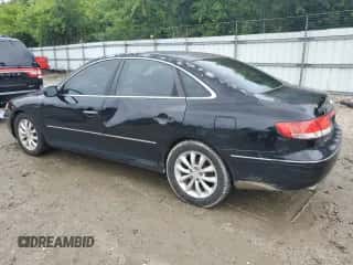 2007 Hyundai Azera SE z VIN KMHFC46F87A154007, wystawiony jako Copart lot #63928394 z przebiegiem 166 339 mil mil oraz Szkoda całkowita • Salvage title. Historia ofert i sprzedaży dostępna na DreamBid. Obrazek 2.