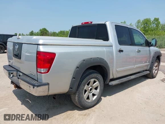 ✅ 2005 Nissan Titan LE • VIN: 1N6AA07B15N501740 • Lot: 42433726. Listed on IAAI with 130,450 mi. Free auction sales archive from the USA and detailed vehicle history report at DreamBid. Image 4.