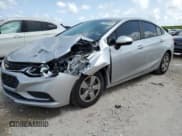 ✅ 2018 Chevrolet Cruze LS • VIN: 1G1BC5SM0J7103630 • Lot: 64805503. Listed on Copart with 124,430 mi. Free auction sales archive from the USA and detailed vehicle history report at DreamBid. Image 1.