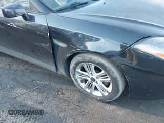 2008 Hyundai Tiburon GS z VIN KMHHM66D38U264396, wystawiony jako IAAI lot #41442064 z przebiegiem 173 737 mil mil oraz . Historia ofert i sprzedaży dostępna na DreamBid. Obrazek 5.