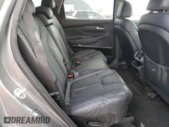 2019 Hyundai Santa Fe Limited с VIN 5NMS53AA6KH111660, выставлен на аукционе Copart как лот 64827895 с пробегом 49 496 миль миль и Списание • Salvage title. История ставок и продаж доступна на DreamBid. Изображение 10.