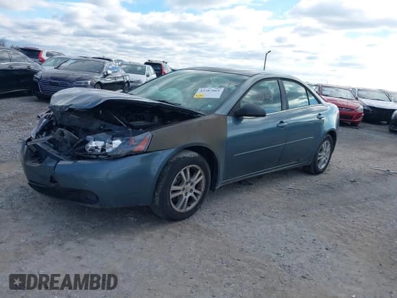 ✅ 2005 Pontiac G6 • VIN: 1G2ZG528454178386 • Lot: 43387065. Wystawiony na IAAI z przebiegiem 194 051 mil. Bezpłatny archiwum sprzedaży aukcyjnych z USA i szczegółowy raport historii pojazdu na DreamBid. Zdjęcie 2.