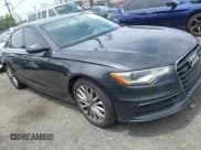 ✅ 2014 Audi A6 Prestige • VIN: WAUHGBFC2EN115704 • Lot: 42233651. Listed on IAAI with 140,079 mi. Free auction sales archive from the USA and detailed vehicle history report at DreamBid. Image 1.