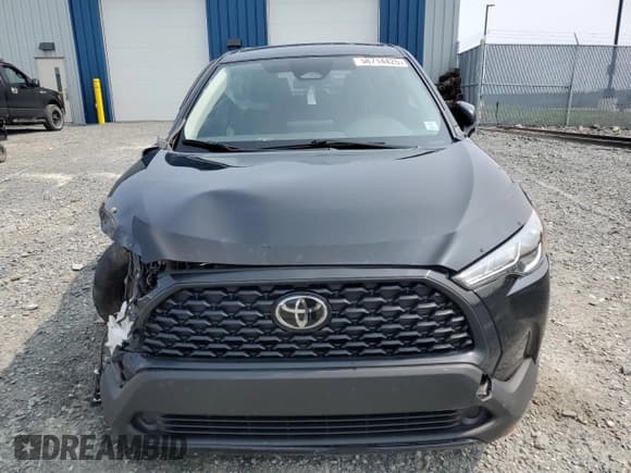 ✅ 2023 Toyota Corolla Cross LE • VIN: 7MUCAABG4PV054490 • Лот: 58714425. Опубликован ранее на Copart с пробегом 79 582 миль. Бесплатный доступ к архиву аукционных продаж из США и подробный отчёт об истории автомобиля на DreamBid. Изображение 5.