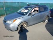 ✅ 2016 Subaru Forester Touring • VIN: JF2SJAVC9GH476078 • Lot: 43415352. Listed on IAAI with 89,423 mi. Free auction sales archive from the USA and detailed vehicle history report at DreamBid. Image 17.