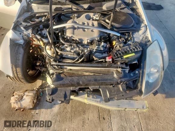 ✅ 2005 Nissan 350Z • VIN: JN1AZ34D05M605342 • Лот: 69046905. Опубликован ранее на Copart с пробегом 84 516 миль. Бесплатный доступ к архиву аукционных продаж из США и подробный отчёт об истории автомобиля на DreamBid. Изображение 11.