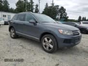 ✅ 2013 Volkswagen Touareg Lux • VIN: WVGEF9BP0DD001551 • Lot: 59818225. Listed on Copart with 171,653 mi. Free auction sales archive from the USA and detailed vehicle history report at DreamBid. Image 4.
