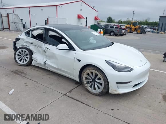 ✅ 2023 Tesla Model 3 • VIN: 5YJ3E1EA3PF563240 • Lot: 42190104. Listed on IAAI with 32,596 mi. Free auction sales archive from the USA and detailed vehicle history report at DreamBid. Image 1.