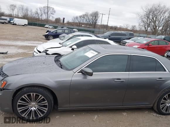 ✅ 2012 Chrysler 300 S • VIN: 2C3CCABG5CH306880 • Lot: 41740931. Listed on IAAI with 94,232 mi. Free auction sales archive from the USA and detailed vehicle history report at DreamBid. Image 13.
