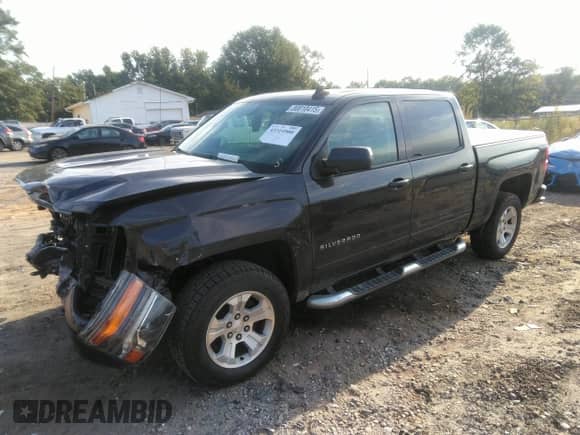 2016 Chevrolet Silverado 1500 LT z VIN 3GCUKREC5GG288672, wystawiony jako IAAI lot #43314900 z przebiegiem 56 245 mil mil oraz . Historia ofert i sprzedaży dostępna na DreamBid. Obrazek 17.