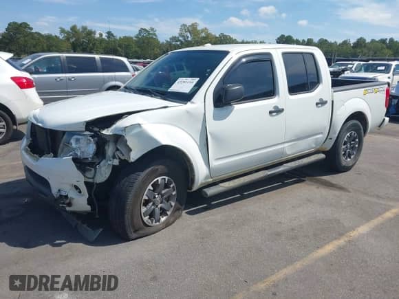 2014 Nissan Frontier Desert Runner z VIN 1N6AD0ER1EN768304, wystawiony jako IAAI lot #43281195 z przebiegiem 115 362 mil mil oraz . Historia ofert i sprzedaży dostępna na DreamBid. Obrazek 18.