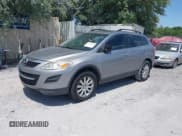 ✅ 2010 Mazda CX-9 Sport • VIN: JM3TB2MA1A0211206 • Lot: 42165804. Listed on IAAI with Not provided. Free auction sales archive from the USA and detailed vehicle history report at DreamBid. Image 2.