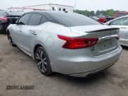 ✅ 2016 Nissan Maxima S • VIN: 1N4AA6AP9GC412013 • Лот: 42905561. Опубликован ранее на IAAI с пробегом 126 197 миль. Бесплатный доступ к архиву аукционных продаж из США и подробный отчёт об истории автомобиля на DreamBid. Изображение 3.