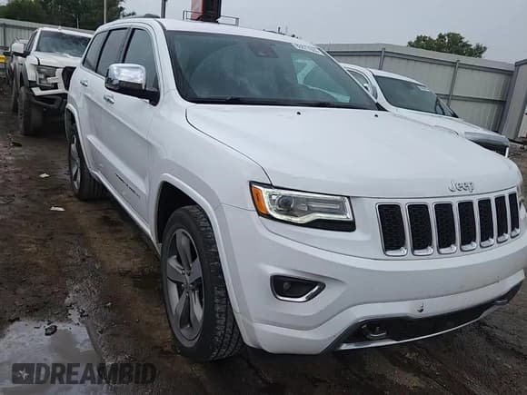 ✅ 2016 Jeep Grand Cherokee Overland • VIN: 1C4RJFCG5GC385029 • Lot: 80877655. Listed on Copart with 111,235 mi. Free auction sales archive from the USA and detailed vehicle history report at DreamBid. Image 14.