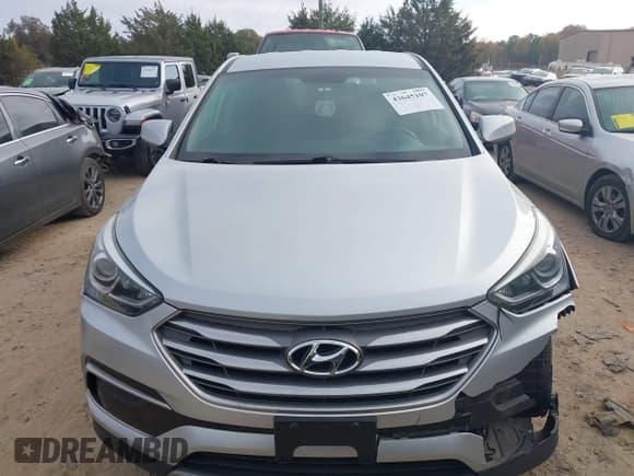 ✅ 2017 Hyundai Santa Fe 2.4L • VIN: 5XYZTDLB2HG463752 • Lot: 43645107. Listed on IAAI with 84,192 mi. Free auction sales archive from the USA and detailed vehicle history report at DreamBid. Image 12.
