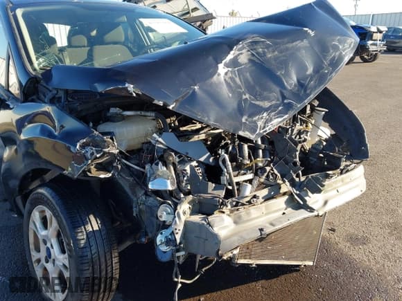 ✅ 2014 Ford Fiesta SE • VIN: 3FADP4EJ6EM133880 • Lot: 43387604. Wystawiony na IAAI z przebiegiem 93 640 mil. Bezpłatny archiwum sprzedaży aukcyjnych z USA i szczegółowy raport historii pojazdu na DreamBid. Zdjęcie 6.