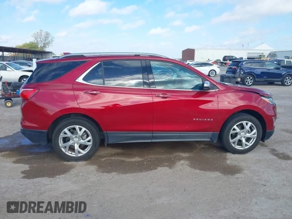 ✅ 2018 Chevrolet Equinox Premier • VIN: 3GNAXMEV6JS643384 • Лот: 43698671. Опубликован ранее на IAAI с пробегом 49 220 миль. Бесплатный доступ к архиву аукционных продаж из США и подробный отчёт об истории автомобиля на DreamBid. Изображение 14.
