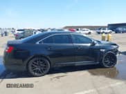 ✅ 2013 Ford Taurus Limited • VIN: 1FAHP2F82DG133885 • Lot: 42393686. Listed on IAAI with 141,912 mi. Free auction sales archive from the USA and detailed vehicle history report at DreamBid. Image 14.