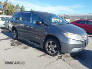 ✅ 2011 Honda Odyssey Touring • VIN: 5FNRL5H98BB063513 • Lot: 43599881. Listed on IAAI with 125,920 mi. Free auction sales archive from the USA and detailed vehicle history report at DreamBid. Image 1.
