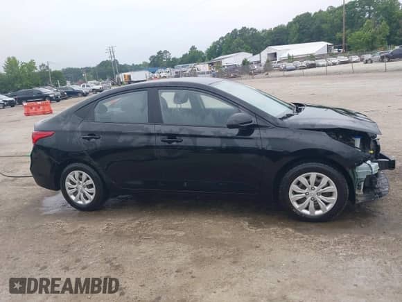 2019 Hyundai Accent SE with VIN 3KPC24A35KE065315, listed as a IAAI auction lot 42590669 with 85,419 mi miles and . Bid and sale history available at DreamBid. Image 14.