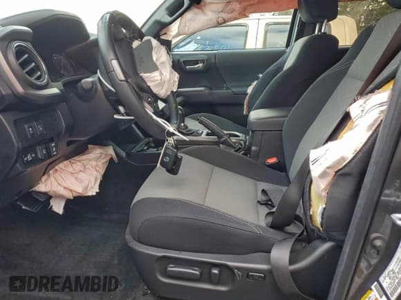 ✅ 2023 Toyota Tacoma TRD Off Road • VIN: 3TMCZ5AN9PM586277 • Lot: 94090515. Listed on Copart with 27,646 mi. Free auction sales archive from the USA and detailed vehicle history report at DreamBid. Image 7.