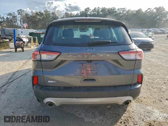 ✅ 2021 Ford Escape S • VIN: 1FMCU0F64MUA17617 • Лот: 93736375. Опубликован ранее на Copart с пробегом 74 261 миль. Бесплатный доступ к архиву аукционных продаж из США и подробный отчёт об истории автомобиля на DreamBid. Изображение 6.