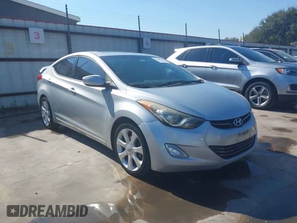 2013 Hyundai Elantra Limited z VIN 5NPDH4AE1DH273663, wystawiony jako IAAI lot #43454550 z przebiegiem 163 051 mil mil oraz . Historia ofert i sprzedaży dostępna na DreamBid. Obrazek 1.