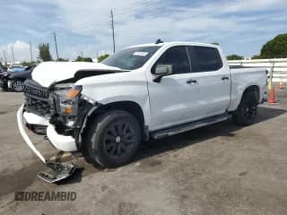 ✅ 2022 Chevrolet Silverado 1500 Custom • VIN: 1GCPABEK3NZ606543 • Лот: 67823405. Опубликован ранее на Copart с пробегом 61 489 миль. Бесплатный доступ к архиву аукционных продаж из США и подробный отчёт об истории автомобиля на DreamBid. Изображение 1.