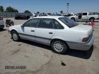 ✅ 1989 Ford Taurus GL • VIN: 1FABP52UXKG244224 • Лот: 59239225. Опубликован ранее на Copart с пробегом 30 853 миль. Бесплатный доступ к архиву аукционных продаж из США и подробный отчёт об истории автомобиля на DreamBid. Изображение 2.