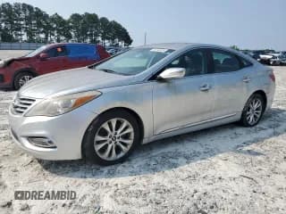 ✅ 2013 Hyundai Azera • VIN: KMHFG4JG9DA252768 • Лот: 59143035. Опубликован ранее на Copart с пробегом 118 260 миль. Бесплатный доступ к архиву аукционных продаж из США и подробный отчёт об истории автомобиля на DreamBid. Изображение 1.