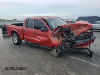 2001 Dodge Dakota Sport z VIN 1B7HG2ANX1S333610, wystawiony jako Copart lot #68866734 z przebiegiem 245 064 mil mil oraz Szkoda całkowita • Salvage title. Historia ofert i sprzedaży dostępna na DreamBid. Obrazek 4.