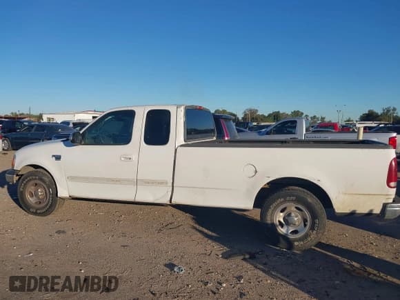 ✅ 2001 Ford F-150 XL • VIN: 1FTRX17W61KF65488 • Lot: 40807535. Listed on IAAI with 298,274 mi. Free auction sales archive from the USA and detailed vehicle history report at DreamBid. Image 13.