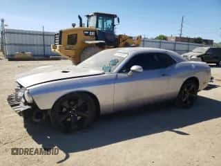 2013 Dodge Challenger SXT z VIN 2C3CDYAGXDH612465, wystawiony jako Copart lot #70135804 z przebiegiem 116 793 mil mil oraz Szkoda całkowita • Salvage title. Historia ofert i sprzedaży dostępna na DreamBid. Obrazek 1.