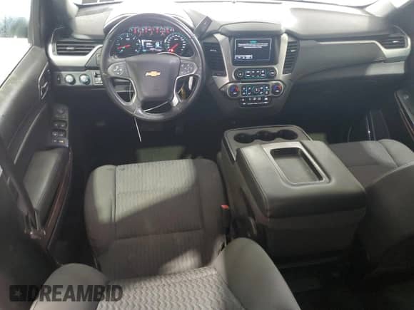 2018 Chevrolet Suburban LS z VIN 1GNSKGECXJR137675, wystawiony jako Copart lot #71902125 z przebiegiem 128 007 mil mil oraz Szkoda całkowita • Salvage title. Historia ofert i sprzedaży dostępna na DreamBid. Obrazek 8.