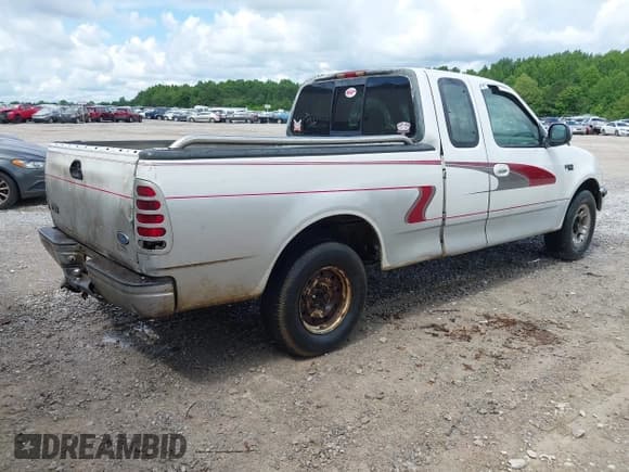 ✅ 1997 Ford F-150 XL • VIN: 1FTEX17L3VNB22949 • Lot: 42377443. Listed on IAAI with 119,148 mi. Free auction sales archive from the USA and detailed vehicle history report at DreamBid. Image 4.