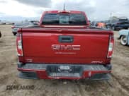 ✅ 2021 GMC Canyon 4WD AT4 • VIN: 1GTG6FEN6M1276977 • Lot: 55390425. Listed on Copart with 70,318 mi. Free auction sales archive from the USA and detailed vehicle history report at DreamBid. Image 6.