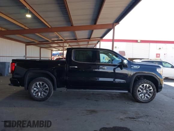 ✅ 2023 GMC Sierra 1500 Denali • VIN: 1GTUUGE81PZ300679 • Лот: 43311954. Опубликован ранее на IAAI с пробегом 34 283 миль. Бесплатный доступ к архиву аукционных продаж из США и подробный отчёт об истории автомобиля на DreamBid. Изображение 13.