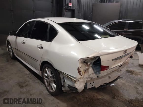 ✅ 2008 Infiniti M • VIN: JNKAY01EX8M606948 • Lot: 39426526. Listed on IAAI with 198,399 mi. Free auction sales archive from the USA and detailed vehicle history report at DreamBid. Image 3.