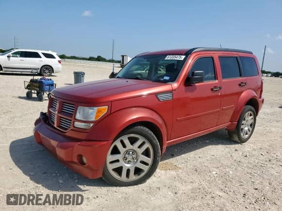 2008 Dodge Nitro R/T with VIN 1D8GT58628W127399, listed as a Copart auction lot 61335475 with 106,255 mi miles and Salvage title. Bid and sale history available at DreamBid. Image 1.