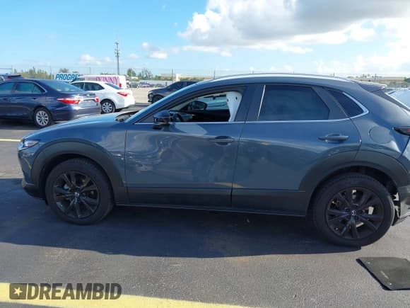 ✅ 2023 Mazda CX-30 S Carbon Edition • VIN: 3MVDMBCM6PM541737 • Lot: 42524854. Listed on IAAI with 55,093 mi. Free auction sales archive from the USA and detailed vehicle history report at DreamBid. Image 14.