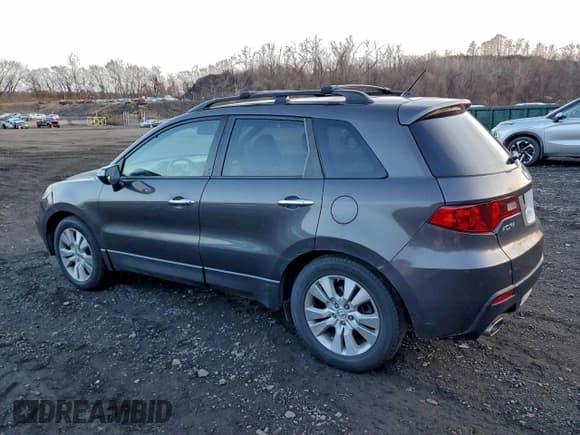 ✅ 2010 Acura RDX • VIN: 5J8TB1H23AA002857 • Лот: 94751115. Опубликован ранее на Copart с пробегом 192 657 миль. Бесплатный доступ к архиву аукционных продаж из США и подробный отчёт об истории автомобиля на DreamBid. Изображение 2.