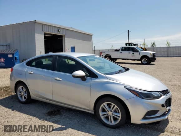 2018 Chevrolet Cruze LT with VIN 1G1BE5SM9J7195377, listed as a Copart auction lot 66462935 with 136,877 mi miles and Salvage title. Bid and sale history available at DreamBid. Image 4.