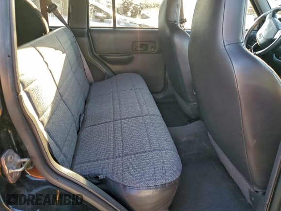 ✅ 2001 Jeep Cherokee Sport • VIN: 1J4FF48S51L596481 • Lot: 94193505. Listed on Copart with 127,415 mi. Free auction sales archive from the USA and detailed vehicle history report at DreamBid. Image 11.