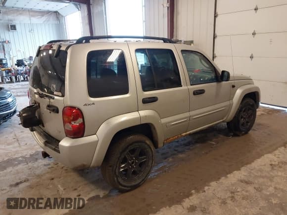 ✅ 2002 Jeep Liberty Limited • VIN: 1J4GL58K92W221602 • Lot: 42305600. Listed on IAAI with 201,998 mi. Free auction sales archive from the USA and detailed vehicle history report at DreamBid. Image 4.