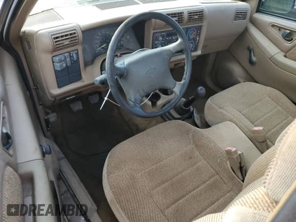 1996 Chevrolet S-10 с VIN 1GCCS1440TK187565, выставлен на аукционе Copart как лот 77079314 с пробегом 158 738 миль миль и Списание • Salvage title. История ставок и продаж доступна на DreamBid. Изображение 8.